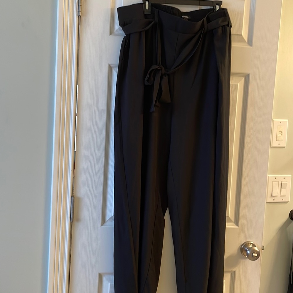 Black Torrid dress pants with waist sash like new .